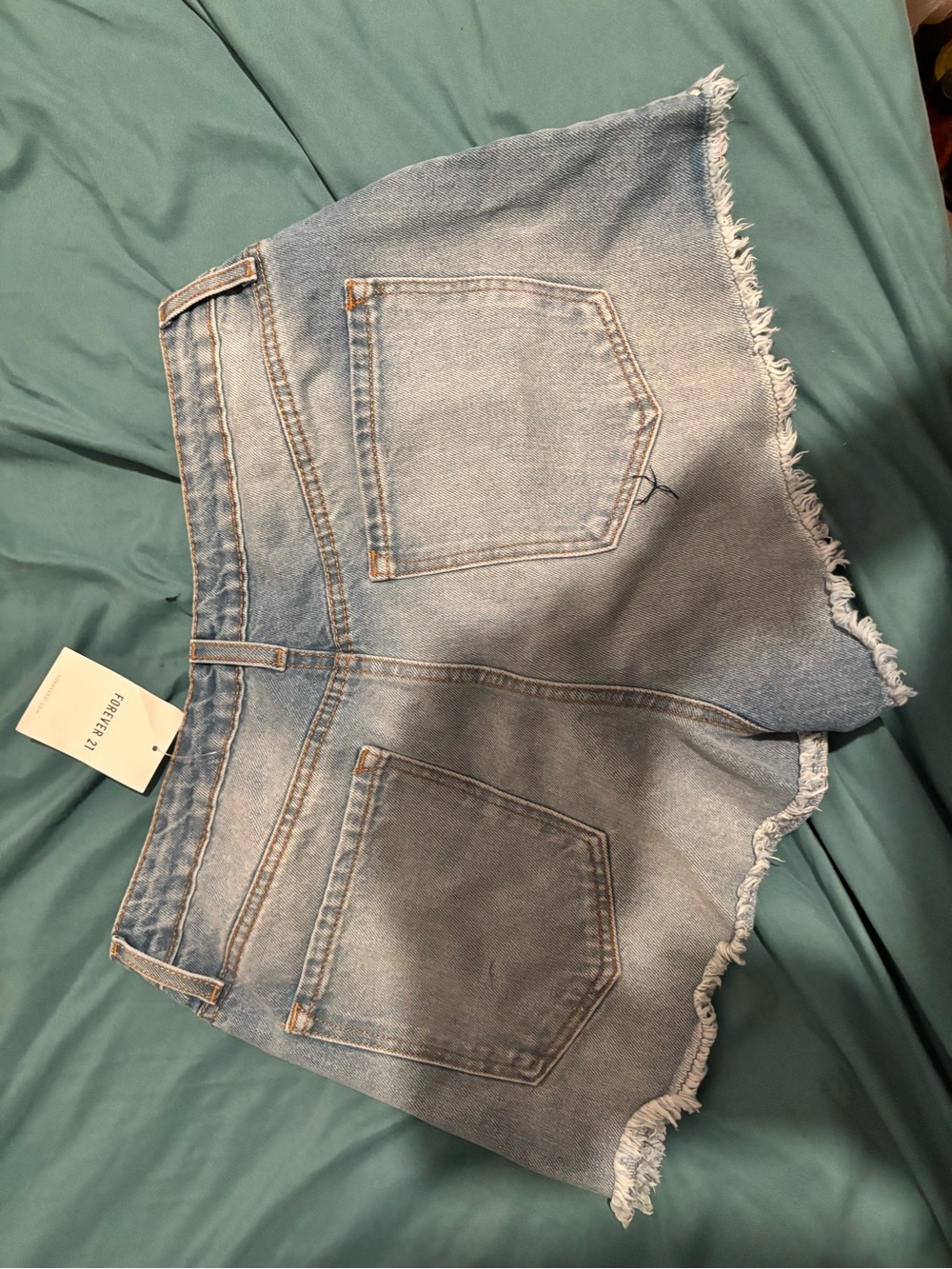 Forever 21 Light Blue Denim Shorts with Distressed Detail